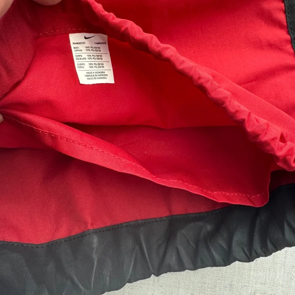 Nike Drawstring Backpack Unisex OS Red Black Swoosh Zippered Pocket Sporty Gym
